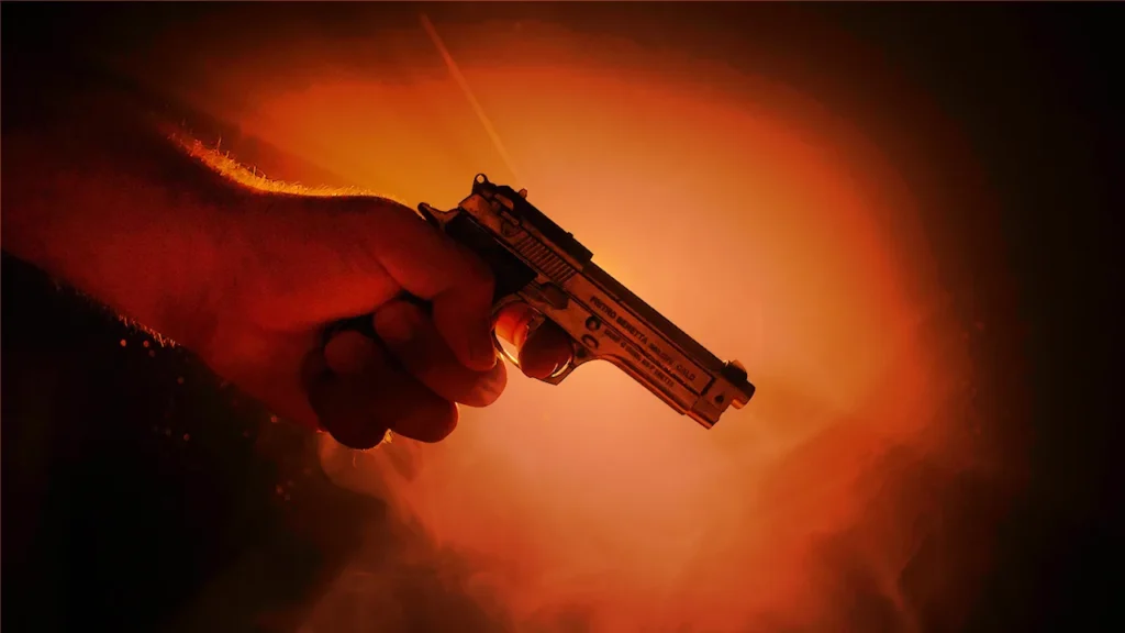hand-with-gun-shutterstock